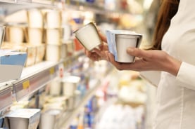 Woman picking up product